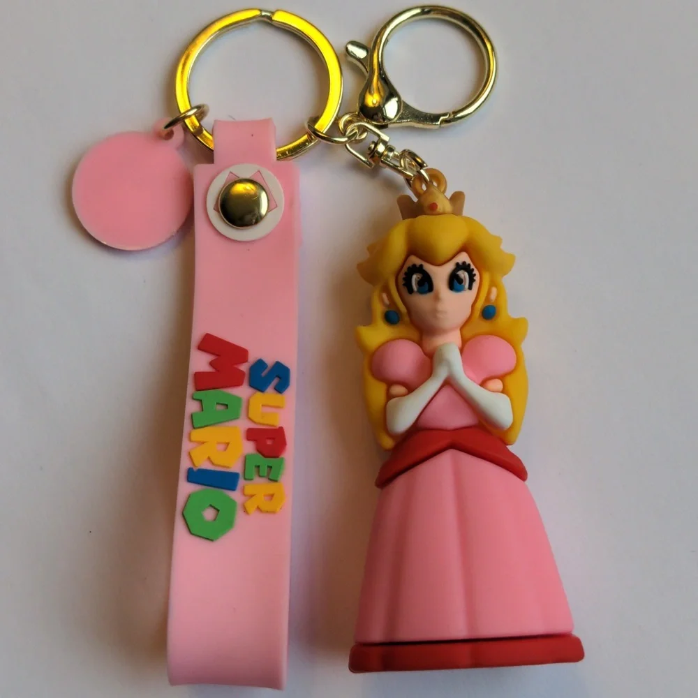 Pink Princess Peach Keychain Set  & Justice Metal keychain. Purse Fobs. New,